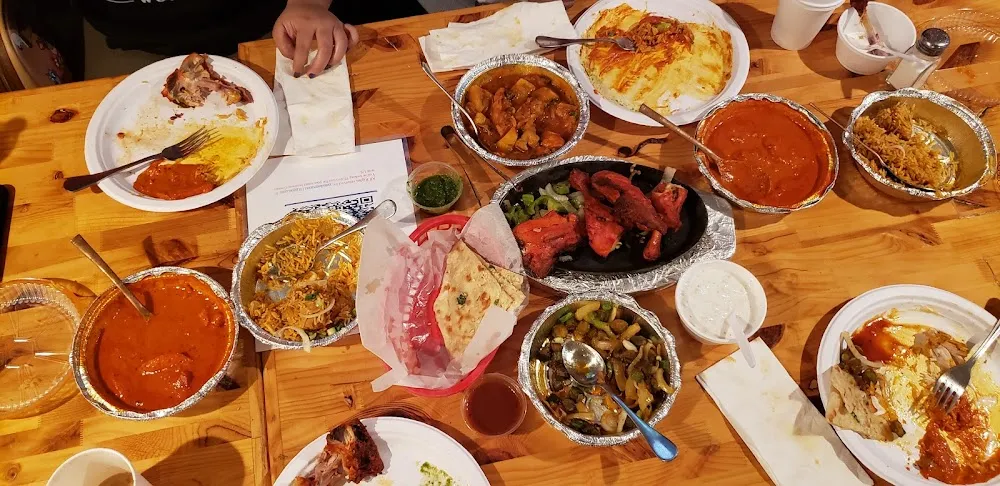 Vegi Bindi Masala Butter Chicken Garlic Naan Chicken Tandoori Chicken Biryani